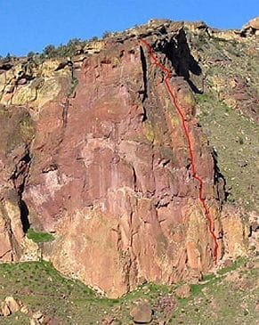 The Red Wall at Smith Rock with a red line showing the popular rock climbing route.